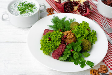 Traditional Georgian dish appetizer Phali served with salad leaves