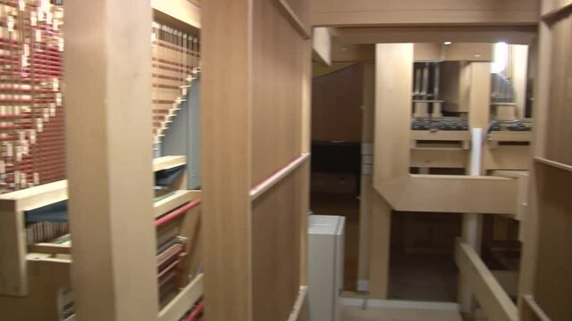 The device of a musical instrument organ from the inside.