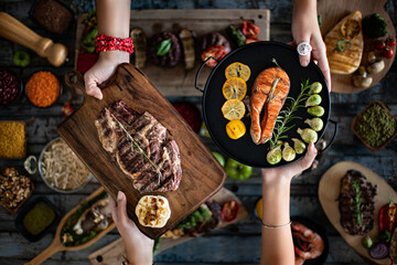 Different kinds of grilled meat on the table at the restaurant