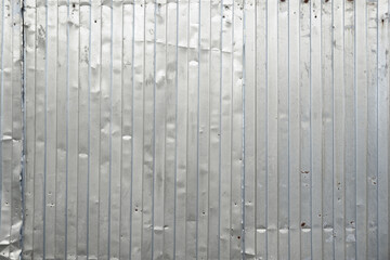 Old metal sheet roof texture. Corrugated sheet background. Rusty metal profile sheets. 