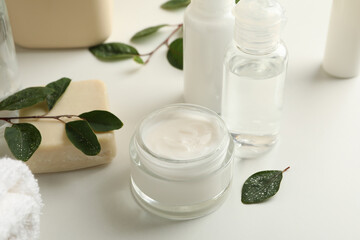 Spa cosmetic products on white table, close up
