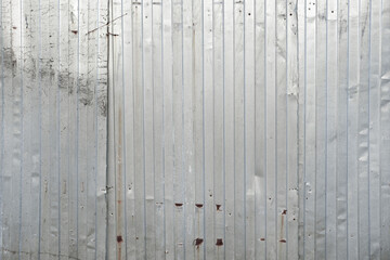 Old metal sheet roof texture. Corrugated sheet background. Rusty metal profile sheets. 