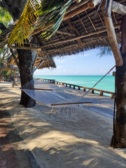 Hammock right by turquoise waters of Indian Ocean