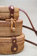 Wooden bags made of rattan palm. Women's accessory.