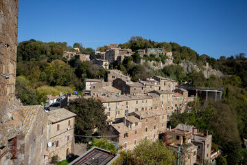 The stone houses at Calcata vecchia,is one of the most important Italian Villages Carved From...