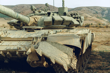 Russian battle tanks at tankodrome in mountains
