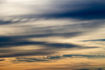 Photograph of the sunset sky dyed in orange as a background material