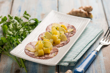 octopus carpaccio with potatoes parsley and ginger
