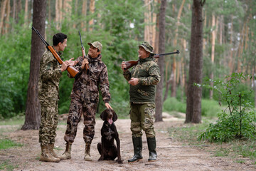 Hunters Talking and Laughing among Pine Trees.