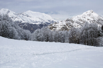 Fototapeta na wymiar Winter. Panoramic view of mountain with a lot of snow in Italy, Lombardy.