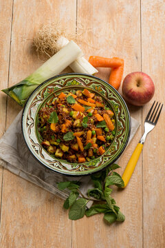 red rice with apple carrots and mint leaf
