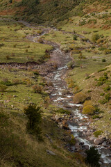 Fototapeta premium Meanders and curves of the Aragon Subordan River. Aragonese Pyrenees, near of Aguas Tuertas valley, Hecho and Anso, Huesca, Spain.