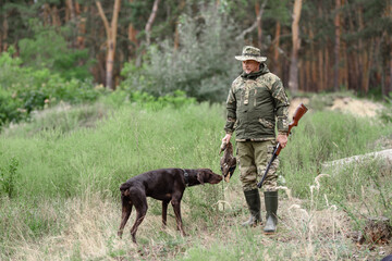 Hunter Holds Wild Duck Adorable Dog Takes Smell.