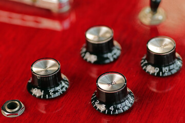 Close up of electric guitar dial 