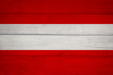 Flagge der Republik Österreich auf einem hölzernen Hintergrund