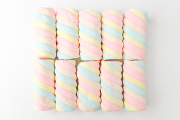 Colored marshmallows on a white background