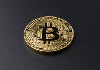 bitcoin on black background texture