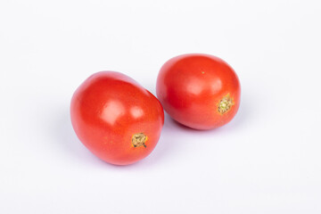 two tomato on white background