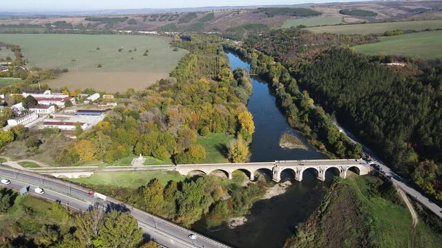 Aerial view of Nineteenth-century bridge over the Yantra River, known as the Kolyu Ficheto Bridge in Byala, Ruse region, Bulgaria