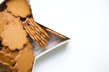 Lovely Swedish gingerbread in shape of a flower called Anna Pepparkaka, tradition in Scandinavia for Christmas holiday season, often eaten with Fika or hot mulled wine.