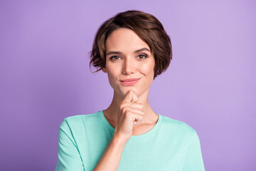 Close up photo of adorable girl arm on chin thinking turquoise outfit isolated on violet color background