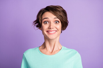 Fototapeta premium Close up portrait of adorable person smile staring camera turquoise outfit isolated on violet color background
