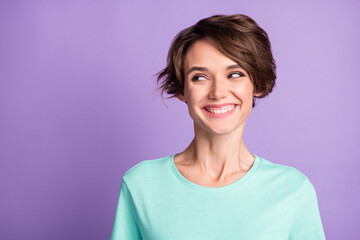 Fototapeta premium Close up portrait of delighted girl look empty space turquoise outfit isolated on violet color background