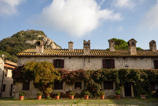 Castle of the Sasso(Cerveteri) ,Italy .It has The crenellated walls that form the door to the village bear the coat of arms of the Patrizi family.With overlooks the Piazza Santa Croce .The tiny Castle