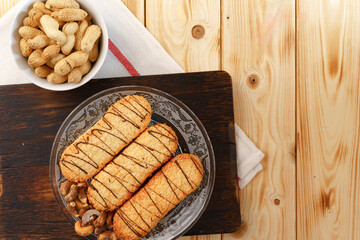 Shortbread cookies on wooden board close up