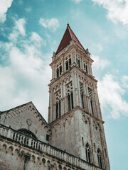 Fototapeta na wymiar View of The Cathedral of St. Lovre in Trogir with summer blue sky