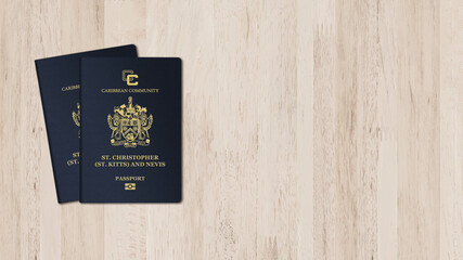 Saint Kitts and Nevis passport on a wooden background, space for texts