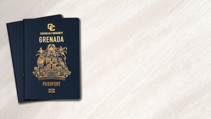 Grenada passport on a wooden background, space for texts - obrazy, fototapety, plakaty