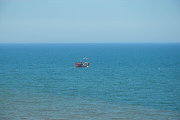Naklejka premium boat in the sea