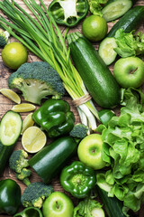 Background of fresh green vegetables and herbs. Close up.