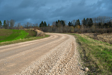 Fototapeta na wymiar Natural gravel country road.