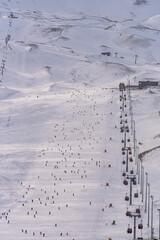 Naklejka na ściany i meble People skiing in Erciyes ski resort. Snowy Mount Erciyes