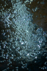 air bubbles on water surface, close view 