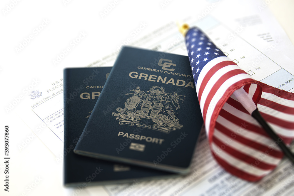 Wall mural two Grenada passport beside USA flag