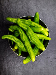 crumpled green peppers