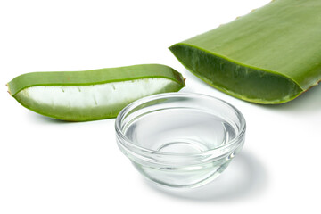 Green leaf of aloe vera and slice on white background close up