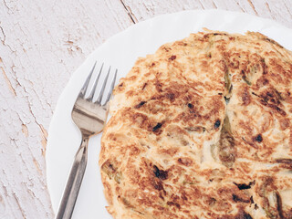 Spanish omelette on a old table