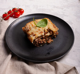 Lasagne with minced meat and bolognese sauce. Italian popular food.