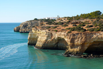 Fototapeta na wymiar village of Benagil sitting on a cliff on south coast of the Algarve