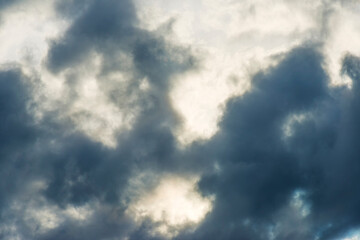Grey white clouds in a blue sky in bright sunlight in autumn, Almere, Flevoland, The Netherlands, November 16, 2020