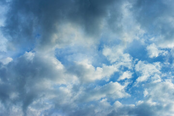 Grey white clouds in a blue sky in bright sunlight in autumn, Almere, Flevoland, The Netherlands, November 16, 2020