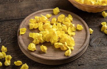Fresh mullein flowers on a cutting board