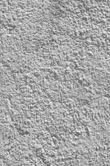 Old dirty spotty concrete wall.