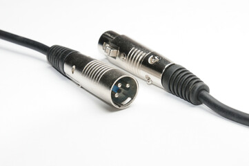 Audio cable with XLR connectors for microphones and professional audio equipment on a white background