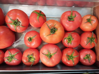 red tomatoes background. Group of tomatoes for the background.