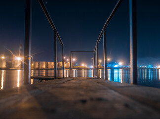 an evening sea, is a pier, port